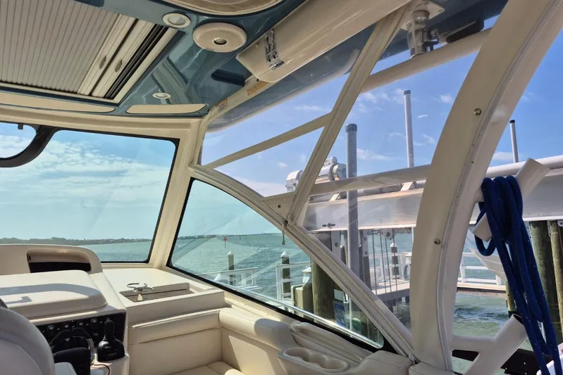 Rising Sun Yacht Photos Pics 2018 Grady-White Express 330 interior view with ocean backdrop and docked marina.