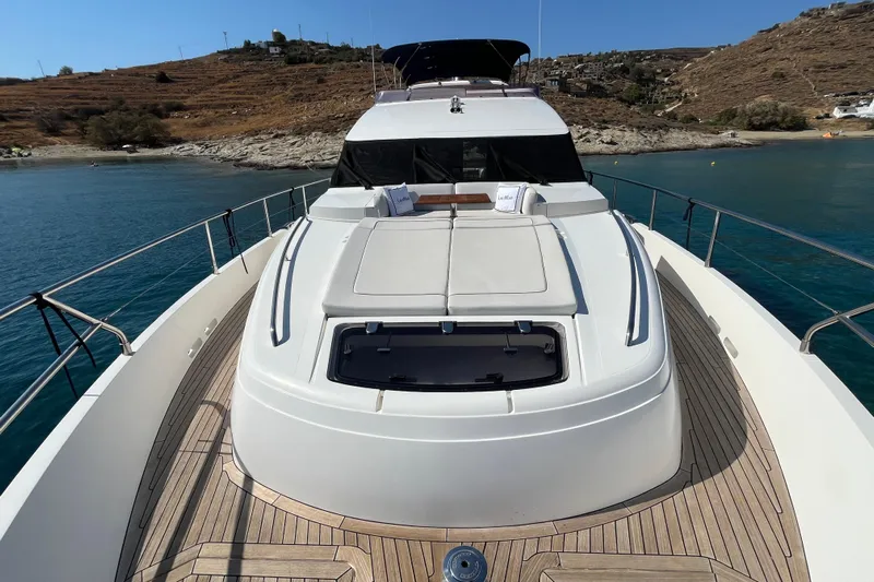  Yacht Photos Pics 2012 Princess 72 Motor Yacht on serene water, showcasing sleek deck design.