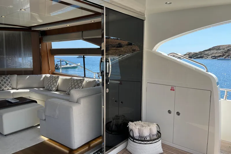  Yacht Photos Pics Luxurious interior of 2012 Princess 72 Motor Yacht with elegant seating and ocean view.