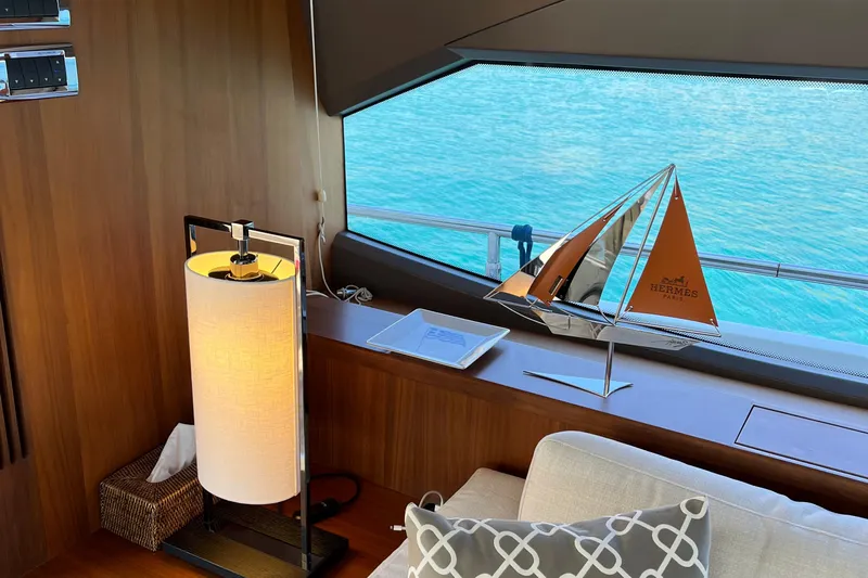  Yacht Photos Pics Luxurious interior of 2012 Princess 72 Motor Yacht with Hermes sailboat model.