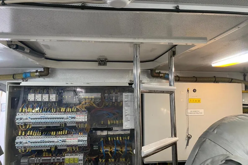  Yacht Photos Pics Electrical panel and ladder inside 2012 Princess 72 Motor Yacht engine room.