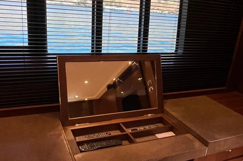  Yacht Photos Pics Luxurious interior of 2012 Princess 72 Motor Yacht with hidden TV and remote controls.