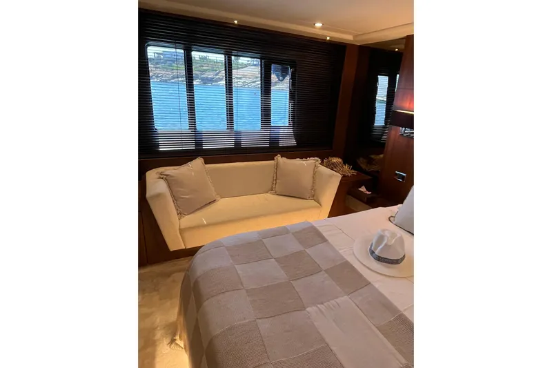  Yacht Photos Pics Luxurious interior of 2012 Princess 72 Motor Yacht with elegant seating and scenic window view.