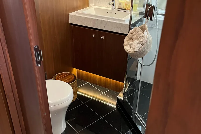  Yacht Photos Pics Luxurious bathroom in 2012 Princess 72 Motor Yacht with modern fixtures and elegant design.