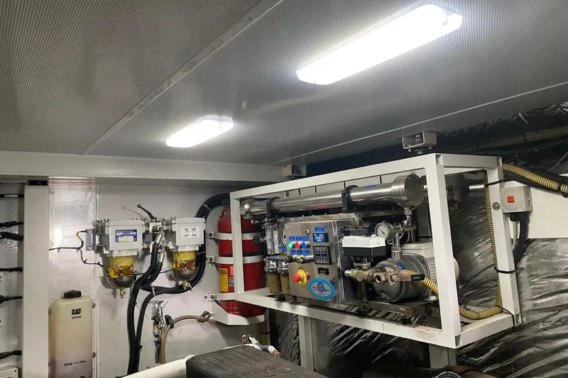  Yacht Photos Pics Engine room of 2012 Princess 72 Motor Yacht with machinery and equipment.