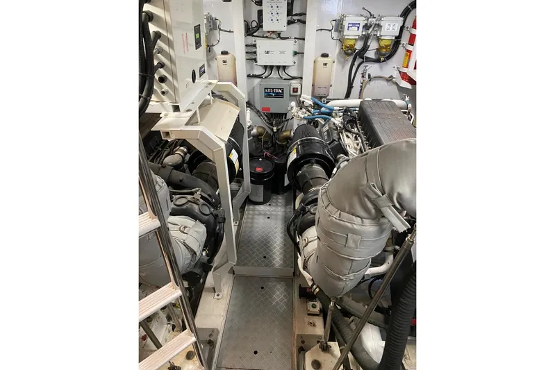  Yacht Photos Pics Engine room of 2012 Princess 72 Motor Yacht, showcasing mechanical components and equipment.