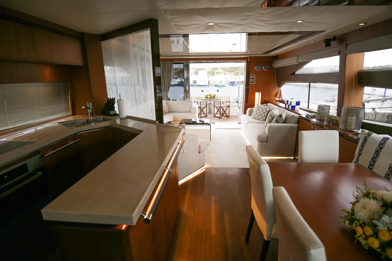  Yacht Photos Pics Luxurious interior of 2012 Princess 72 Motor Yacht with elegant furnishings and spacious layout.