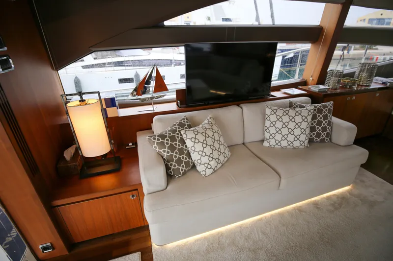  Yacht Photos Pics Luxurious interior of 2012 Princess 72 Motor Yacht with elegant sofa and decor.