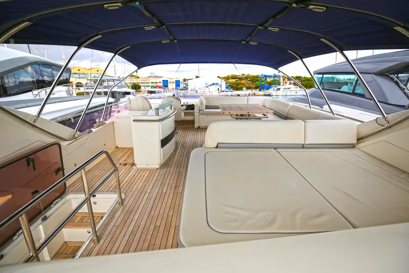  Yacht Photos Pics Luxurious 2012 Princess 72 Motor Yacht with spacious deck and elegant seating area.