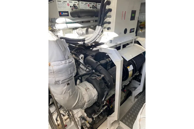  Yacht Photos Pics Engine room of 2012 Princess 72 Motor Yacht, showcasing machinery and components.