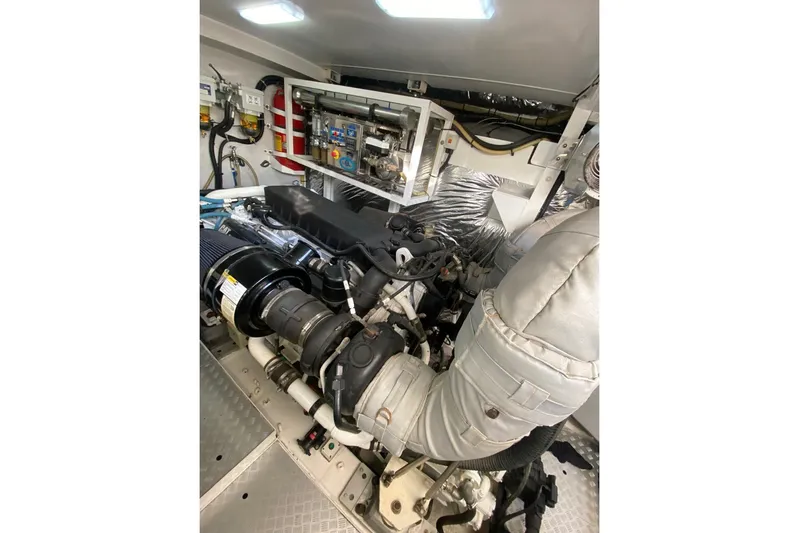  Yacht Photos Pics Engine room of 2012 Princess 72 Motor Yacht, showcasing mechanical components and systems.