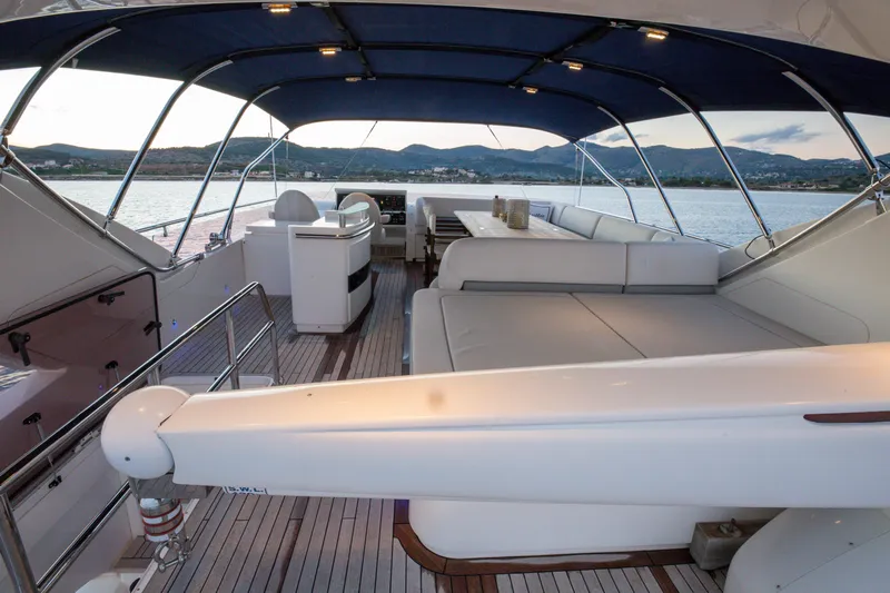  Yacht Photos Pics Luxurious 2012 Princess 72 Motor Yacht with spacious deck and elegant seating area.