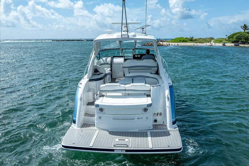  Yacht Photos Pics 2022 Formula 40 Performance Cruiser on open water, rear view, sunny day.