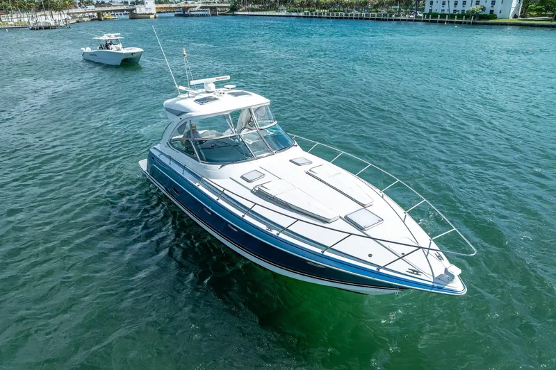  Yacht Photos Pics 2022 Formula 40 Performance Cruiser on clear blue water, showcasing sleek design and luxury.