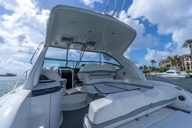  Yacht Photos Pics 2022 Formula 40 Performance Cruiser, luxurious deck view, under a bright blue sky.