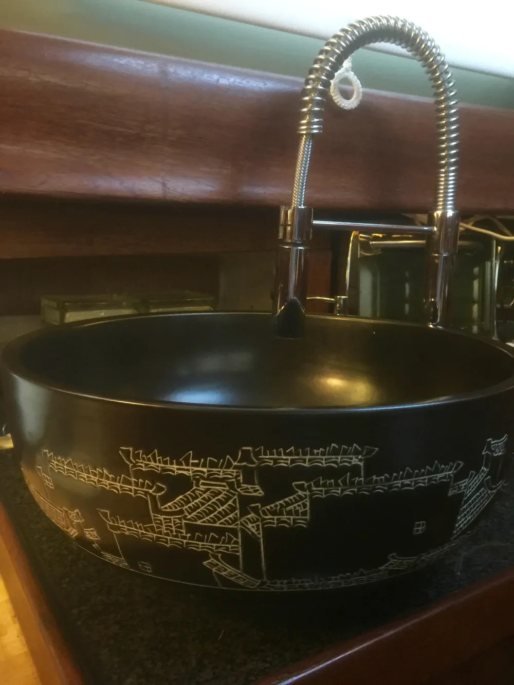 Vintage Formosa 41 sink with intricate design, featuring a modern faucet, 1971 model.