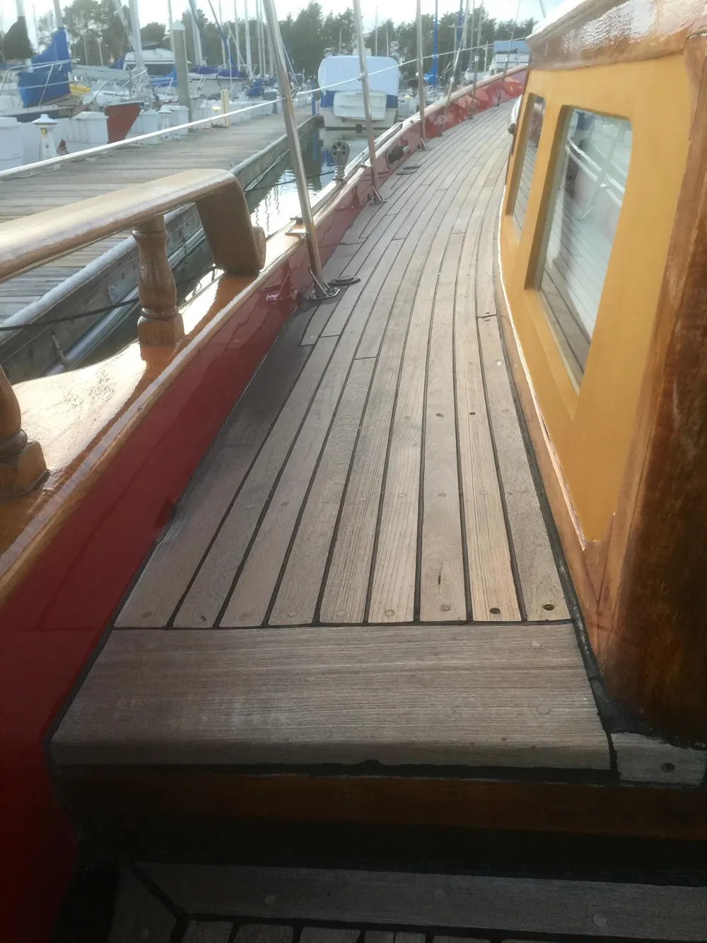 1971 Formosa 41 sailboat deck with wooden finish and vibrant cabin colors.