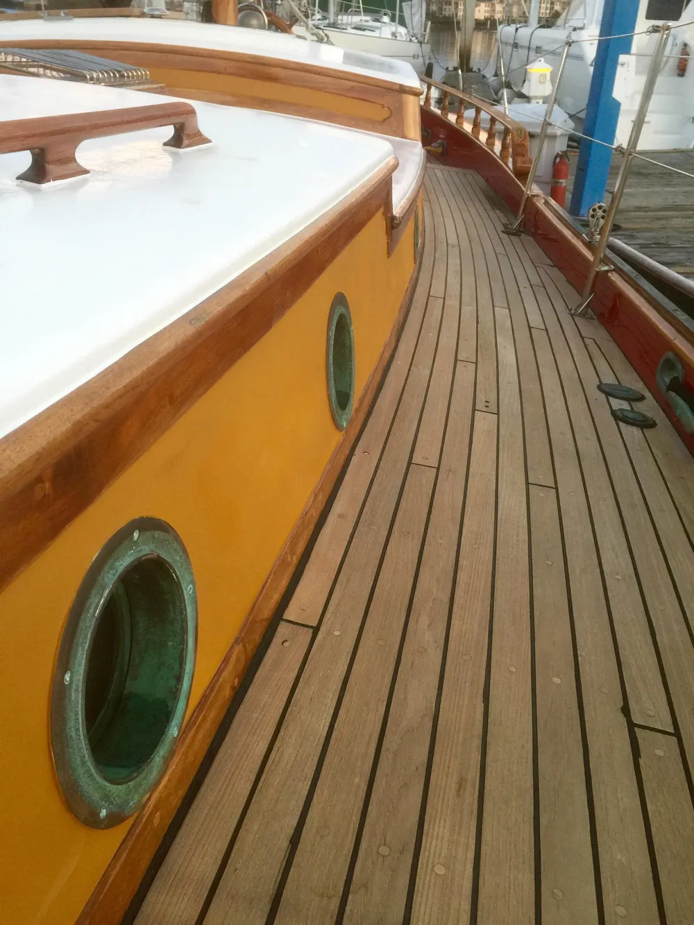 1971 Formosa 41 sailboat deck with wooden finish and portholes.