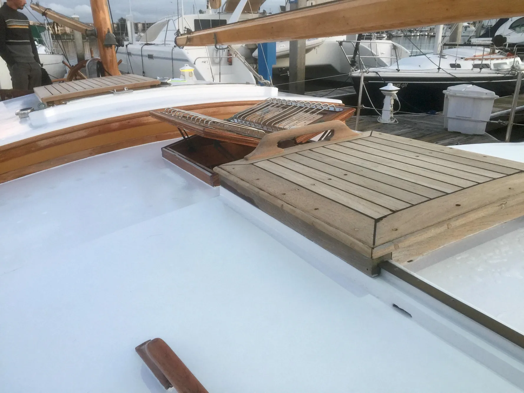 1971 Formosa 41 sailboat deck with wooden hatch and seating area.