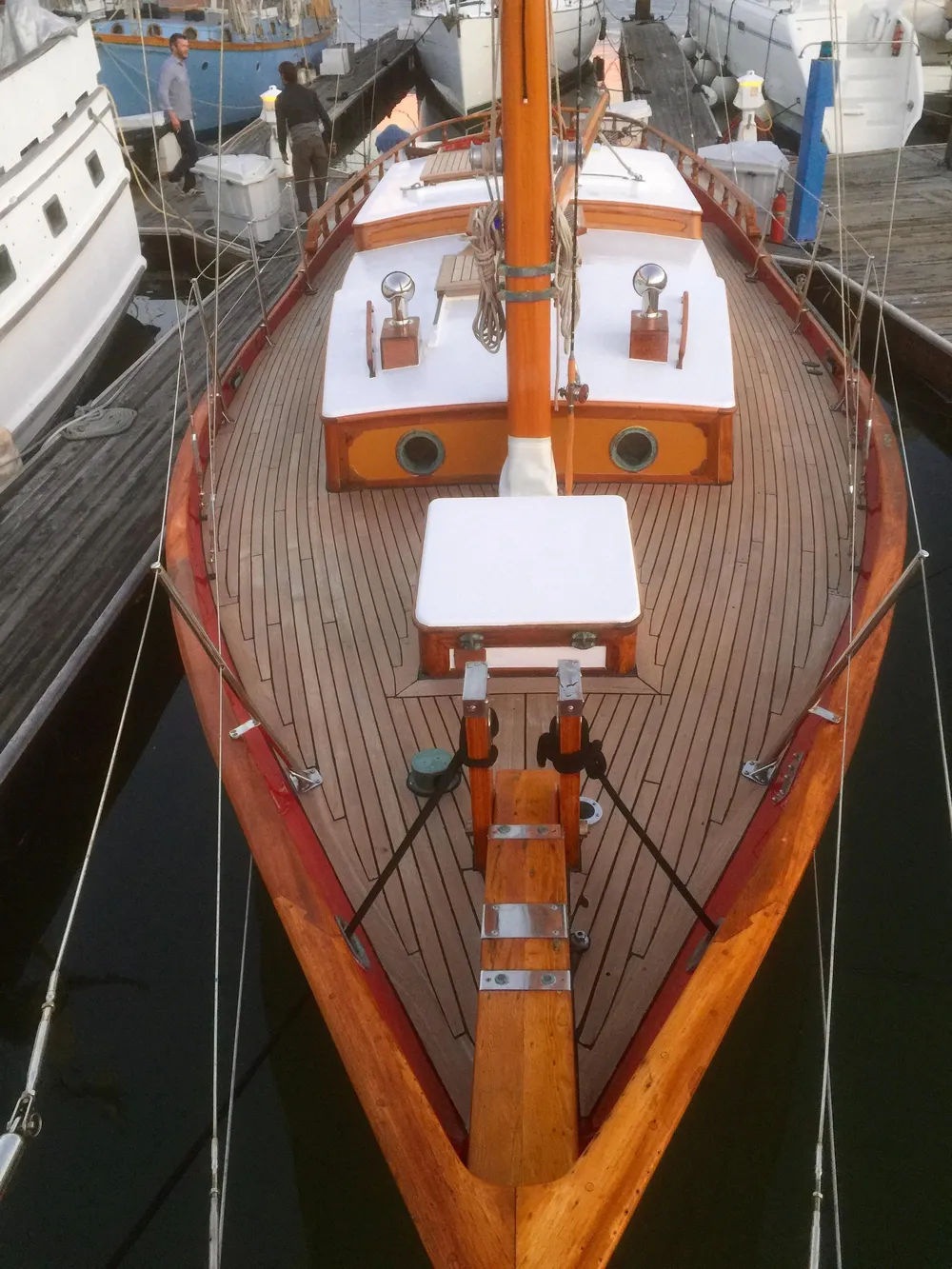 1971 Formosa 41 sailboat with wooden deck, docked at marina.