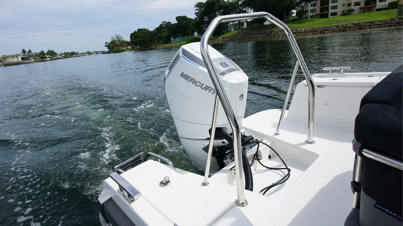 In-stock 2024 Nimbus T9 #143 Yacht Photos Pics 2024 Nimbus Tender 9 #143 boat with Mercury outboard motor on water.