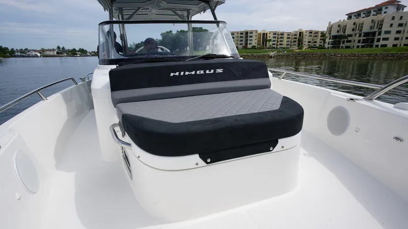 In-stock 2024 Nimbus T9 #143 Yacht Photos Pics 2024 Nimbus Tender 9 #143 boat with cushioned seating on deck.