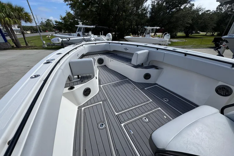  Yacht Photos Pics 2020 Fountain 38 Tournament Edition boat interior with seating and storage compartments.