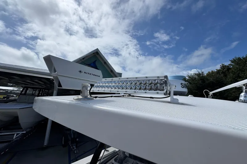  Yacht Photos Pics 2020 Fountain 38 Tournament Edition boat with Nitetack equipment under a partly cloudy sky.