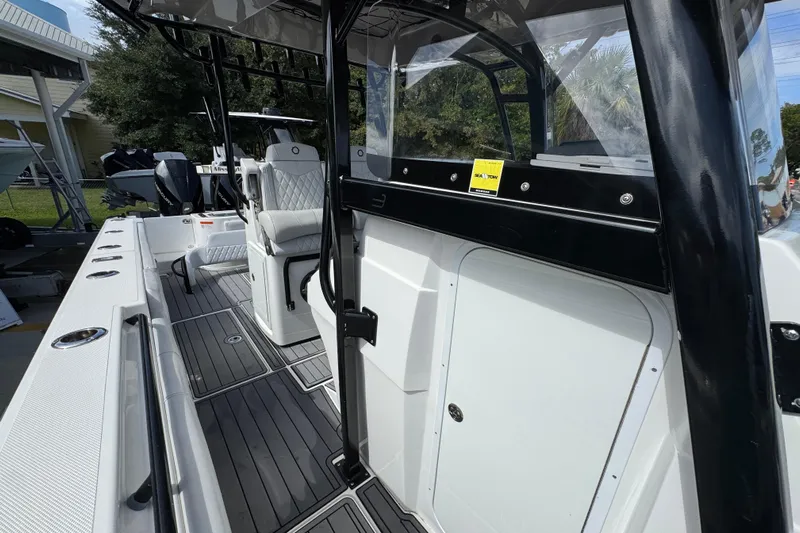  Yacht Photos Pics 2020 Fountain 38 Tournament Edition boat interior with seating and sleek design.