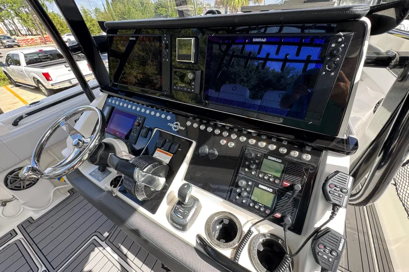  Yacht Photos Pics 2020 Fountain 38 Tournament Edition boat dashboard with advanced navigation and control systems.