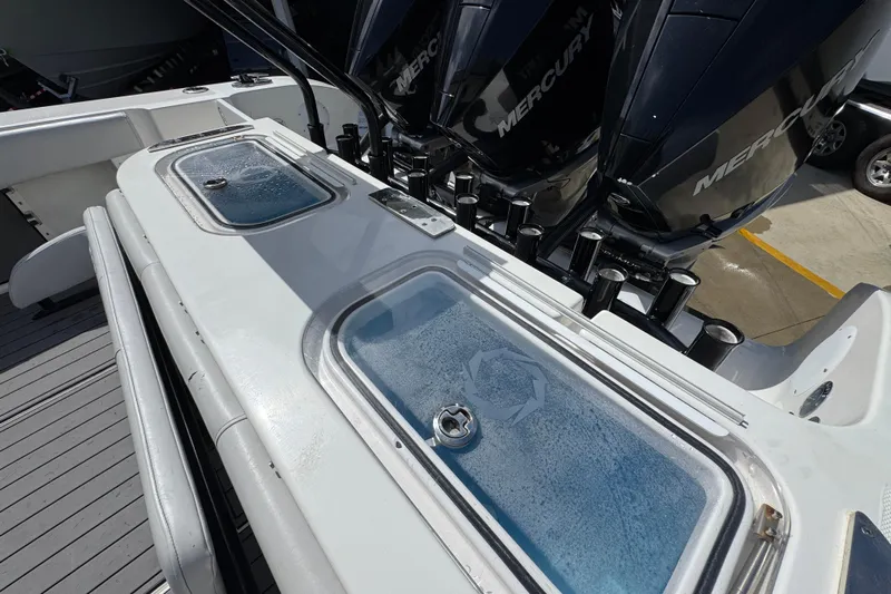  Yacht Photos Pics 2020 Fountain 38 Tournament Edition boat with Mercury engines and livewell compartments.