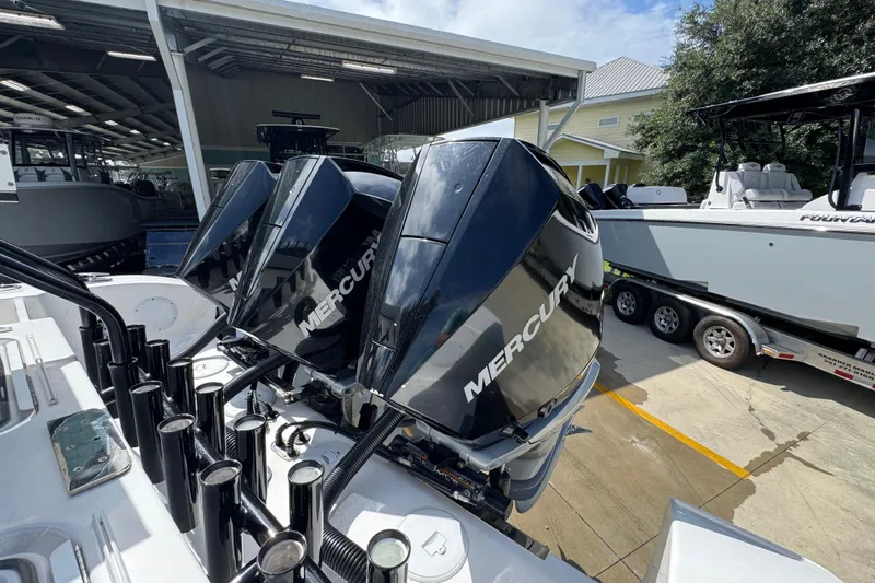  Yacht Photos Pics 2020 Fountain 38 Tournament Edition with Mercury outboard engines in a marina setting.