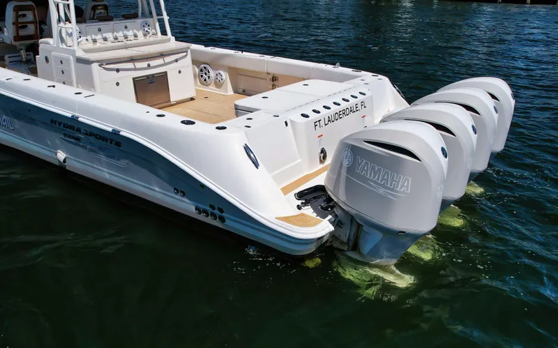 Strait To Voicemail Yacht Photos Pics 2018 HCB 53 Sueños boat with Yamaha outboard engines in water.