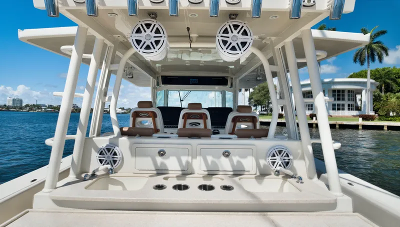 Strait To Voicemail Yacht Photos Pics 2018 HCB 53 Sueños luxury boat interior with seating and speakers.