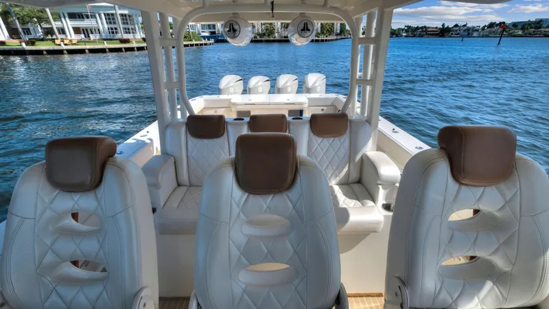 Strait To Voicemail Yacht Photos Pics Luxury seating on 2018 HCB 53 Sueños boat with waterfront view.