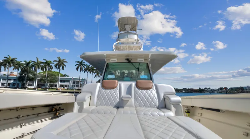 Strait To Voicemail Yacht Photos Pics 2018 HCB 53 Sueños luxury yacht with plush seating and scenic waterfront view.
