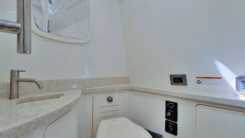 Strait To Voicemail Yacht Photos Pics Modern bathroom in 2018 HCB 53 Sueños boat with sink and toilet.