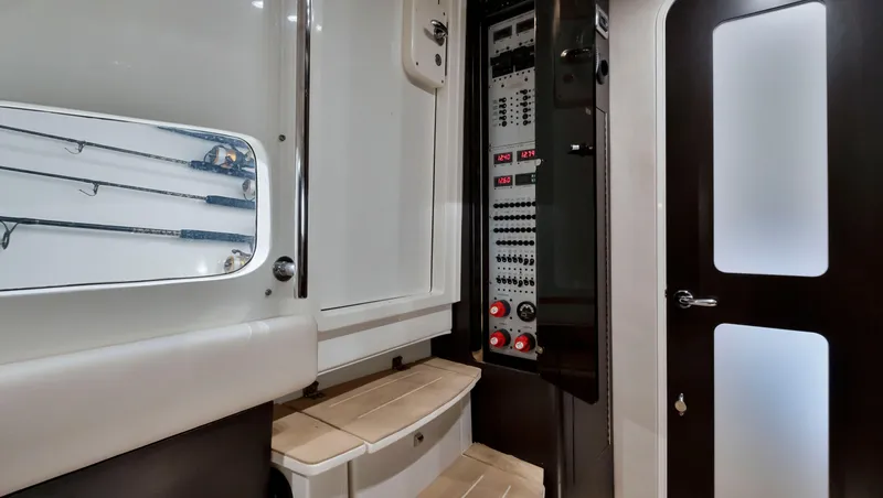 Strait To Voicemail Yacht Photos Pics Interior control panel of 2018 HCB 53 Sueños boat with seating and storage.