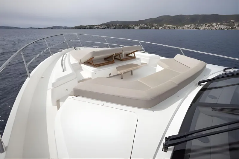  Yacht Photos Pics Luxurious 2019 Princess F70 yacht with spacious sunbathing deck on calm waters.