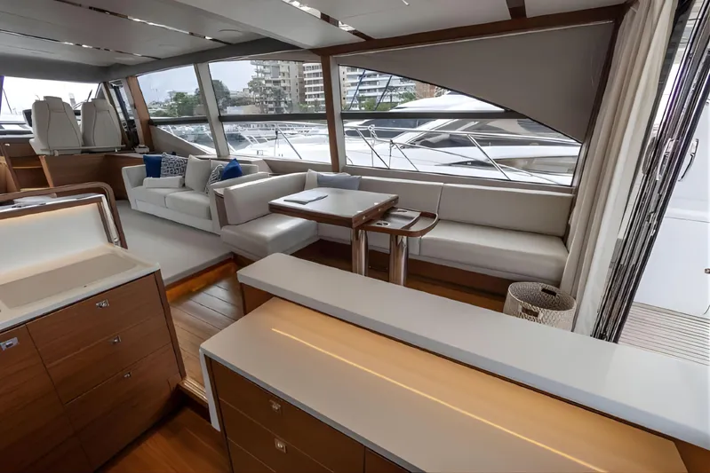  Yacht Photos Pics Luxurious interior of 2019 Princess F70 yacht with modern seating and elegant design.