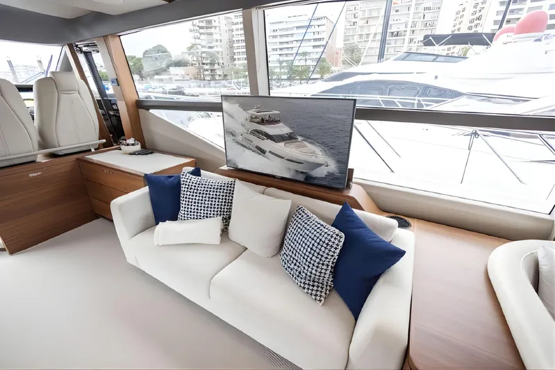  Yacht Photos Pics Luxurious interior of 2019 Princess F70 yacht with elegant seating and large windows.
