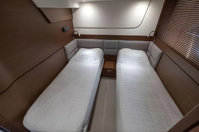  Yacht Photos Pics Luxurious twin cabin interior of 2019 Princess F70 yacht with modern design.