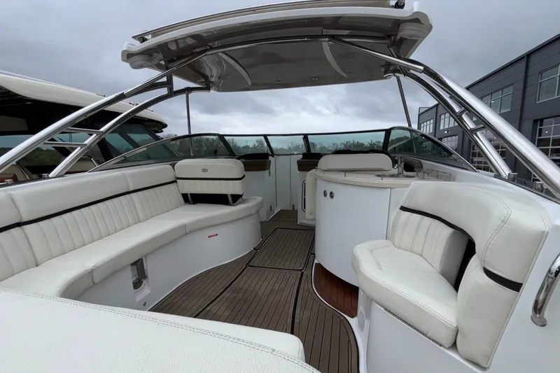  Yacht Photos Pics Luxurious 2022 Cobalt R35 boat interior with white seating and sleek design.