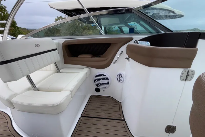  Yacht Photos Pics Interior of 2022 Cobalt R35 boat with white seating and wood flooring.