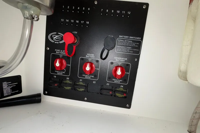  Yacht Photos Pics Battery switch panel in a 2022 Cobalt R35 boat, featuring multiple control knobs.