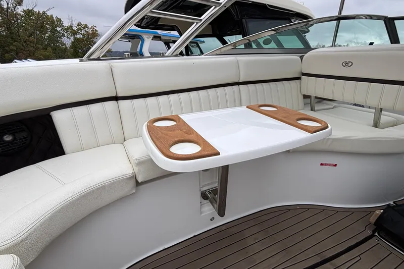  Yacht Photos Pics Luxurious seating area on 2022 Cobalt R35 boat with wooden cup holders.