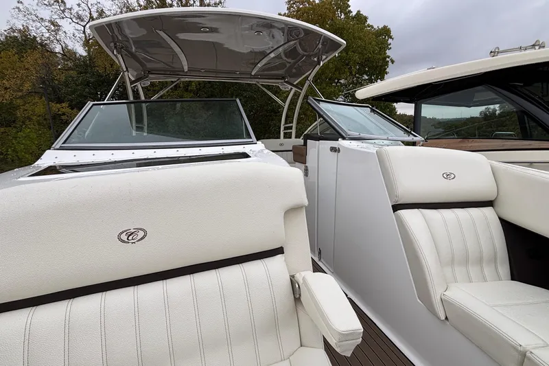  Yacht Photos Pics 2022 Cobalt R35 boat interior with white leather seating and sleek design.