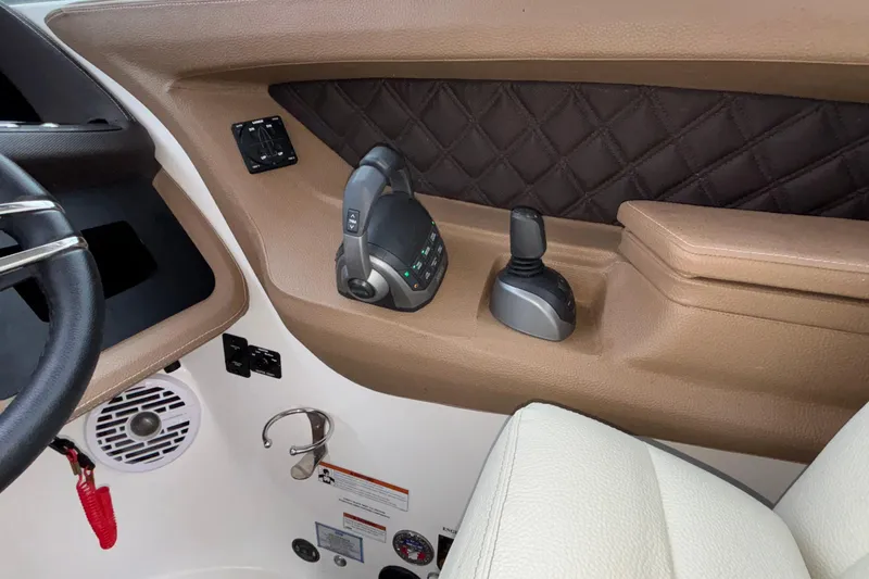  Yacht Photos Pics Interior of 2022 Cobalt R35 boat with steering and control panel.