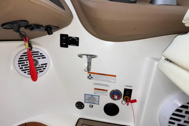  Yacht Photos Pics Interior of a 2022 Cobalt R35 boat with control panel and safety features.