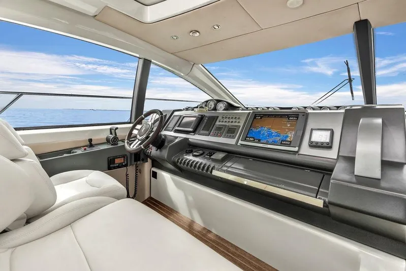  Yacht Photos Pics Luxurious 2006 Azimut 68S yacht cockpit with modern navigation system and ocean view.
